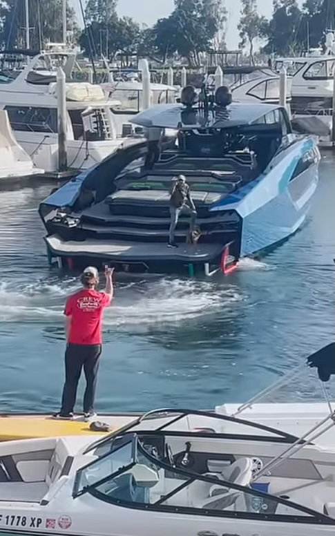 Marina worker Joseph Holt flips the bird to yacht owner Ajay Thakore on March 10, 2024 in San Diego.