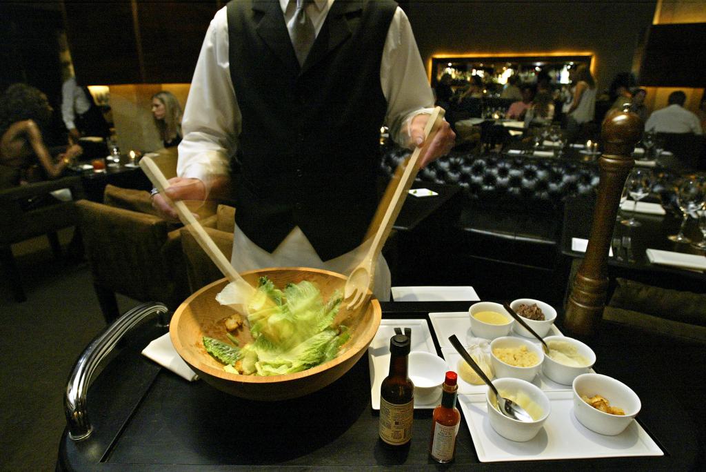 The salad is traditionally prepared table side. 