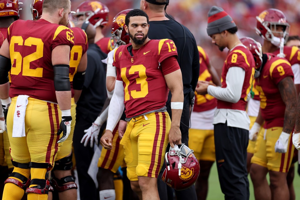 Caleb Williams #13 of the USC Trojans looks on during a game against the UCLA Bruins at United Airlines Field at the Los Angeles Memorial Coliseum on November 18, 2023 in Los Angeles, California.  