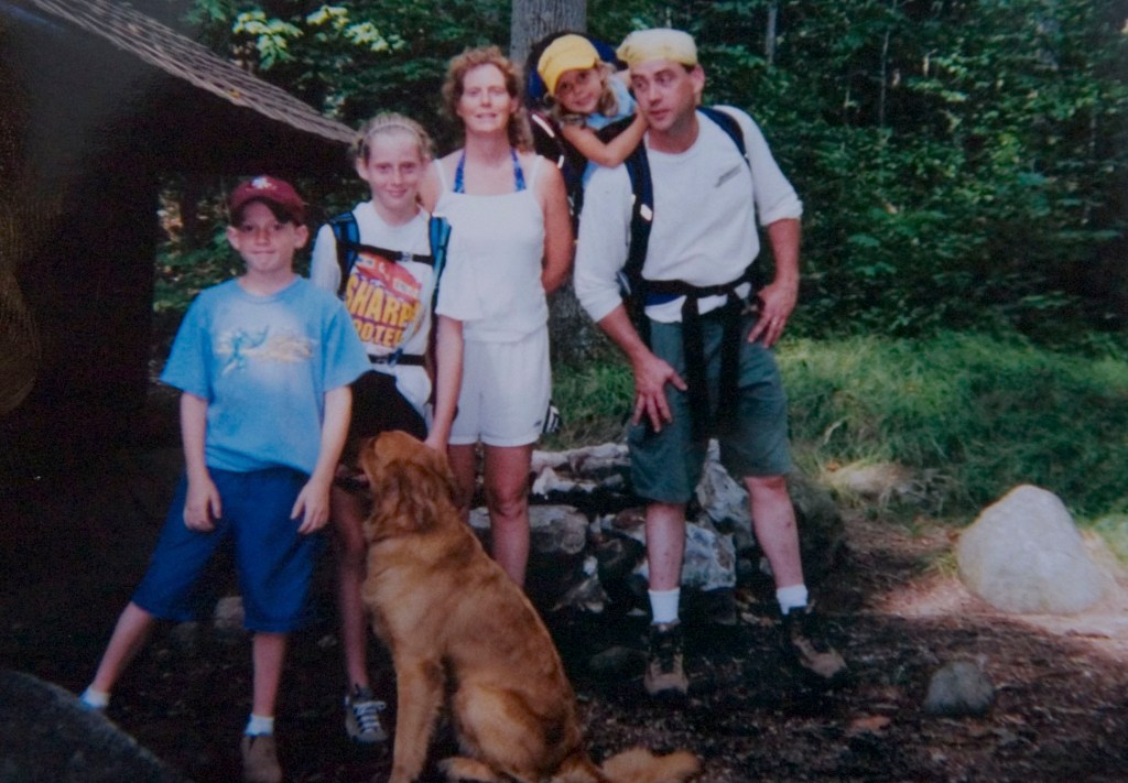 Detective Patrick Rafferty (r) on camping trip in upstate New York last year with (l-r) sone Kevin, daughter Kara, wife Eileen, and daughter Emma.