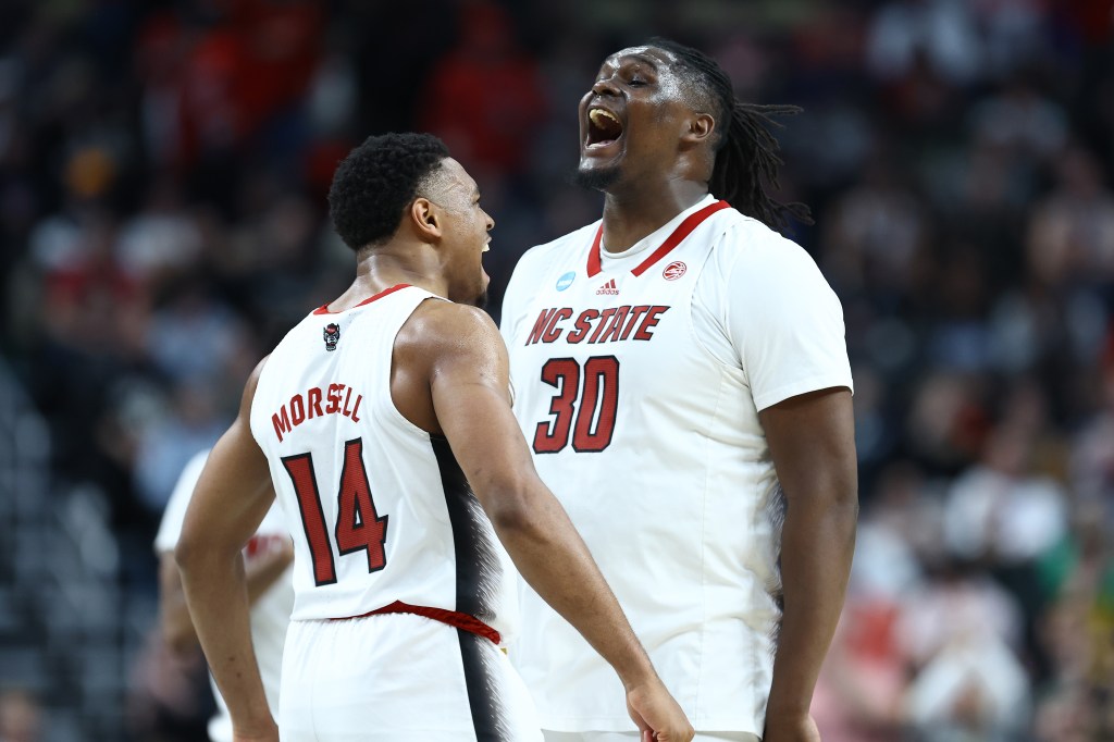 NC State's DJ Burns Jr. (r) has become a sensation during the tournament.