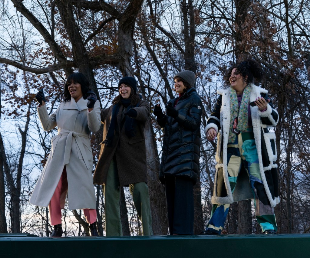 Christina Elmore, Melissa Benoist, Carla Gugino, Natasha Behnam standing in a line. 