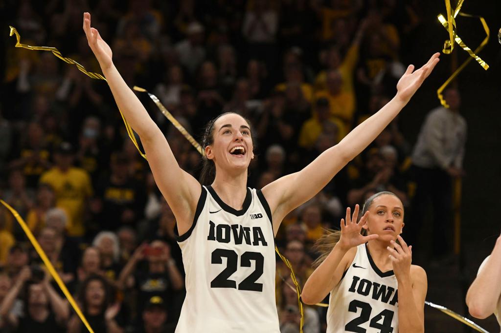 Iowa guard Caitlin Clark (22) celebrates during Senior Day ceremonies following a victory over Ohio State in an NCAA college basketball game, Sunday, March 3, 2024, in Iowa City, Iowa.