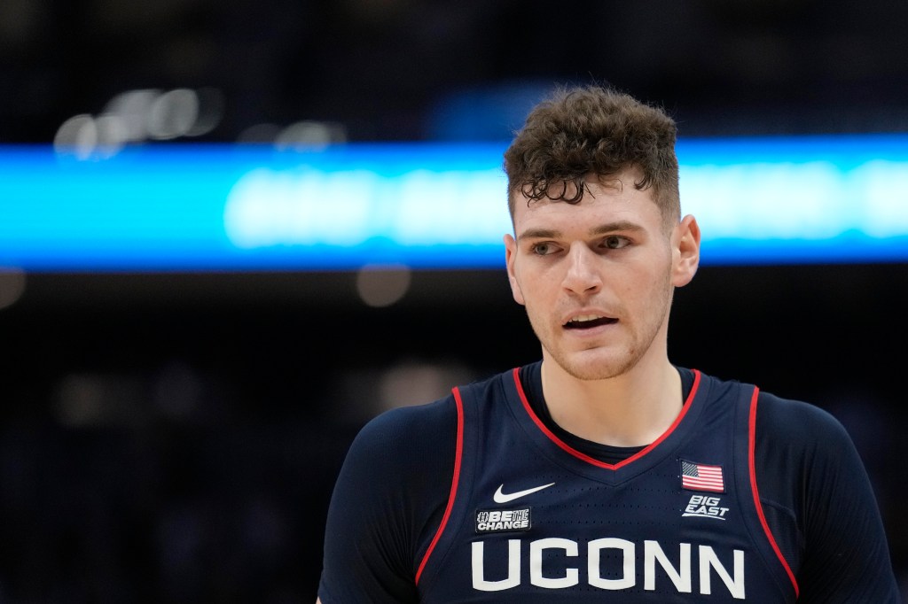 Donovan Clingan #32 of the Connecticut Huskies in action during the second half against the Marquette Golden Eagles.