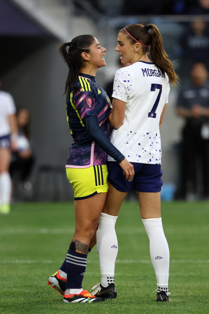 United States forward Alex Morgan (7) confronts Colombia forward Maria Usme (11) during the first half of the Concacaf W Gold Cup quarterfinal game at BMO Stadium on March 3, 2024. 