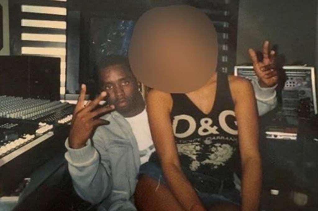 Sean "Diddy" Combs with unidentified person