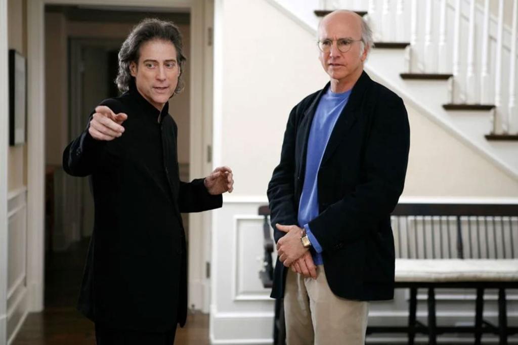 Richard Lewis standing next to Larry David. 