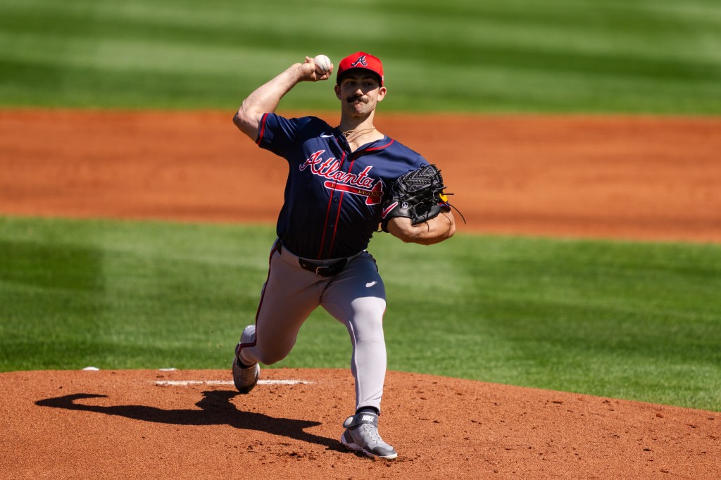 Spencer Strider #99 of the Atlanta Braves pitches in the first inning during a Grapefruit League spring training game against the Tampa Bay Rays.