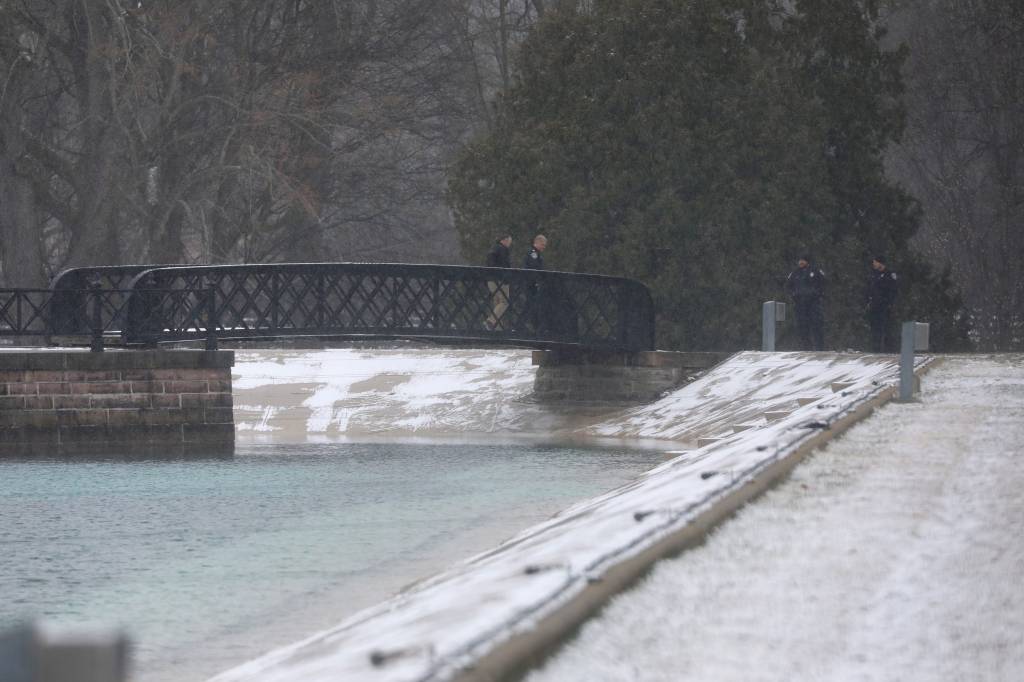 Police at the Highland Park Reservoir.