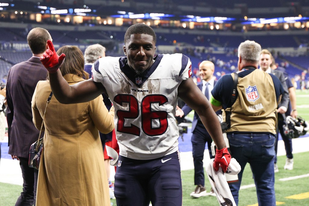 Devin Singletary #26 of the Houston Texans runs off the field after the game against the Indianapolis Colts at Lucas Oil Stadium.