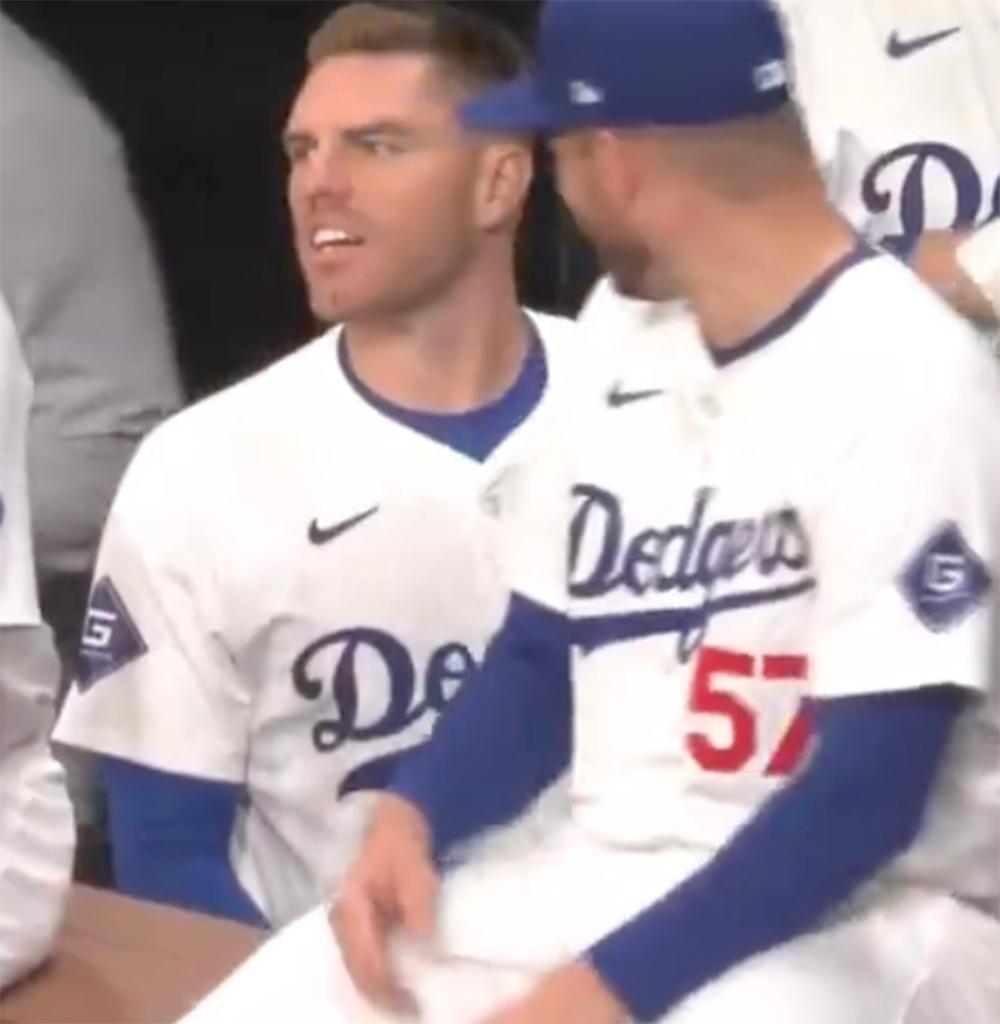 Dodgers players look on during a Seoul Series game in March 2024.