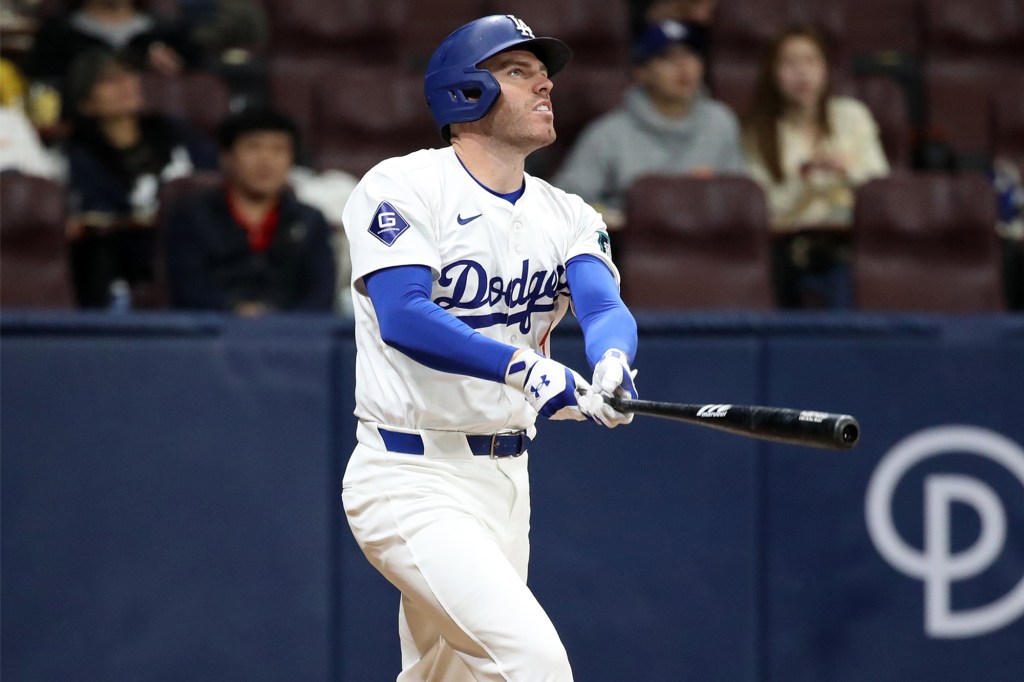 Freddie Freeman hits a double in the 4th inning during the exhibition game between Los Angeles Dodgers and Kiwoom Heroes on March 17, 2024.