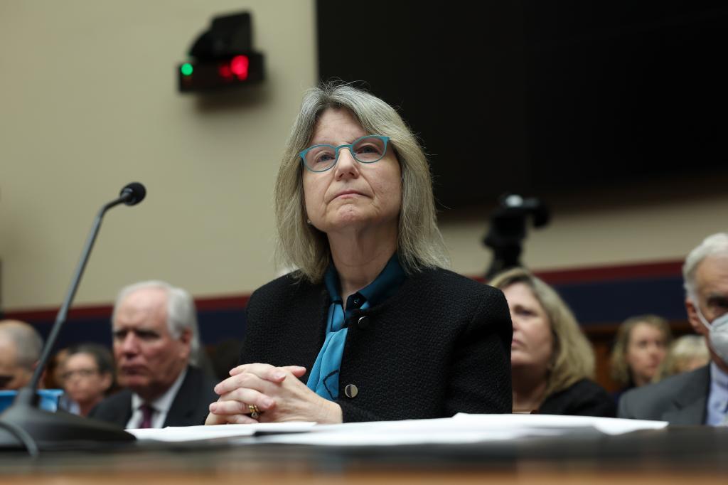 Dr. Sally Kornbluth, President of Massachusetts Institute of Technology, sitting at a table with microphones, testifying before the House Education and Workforce Committee on campus antisemitism.