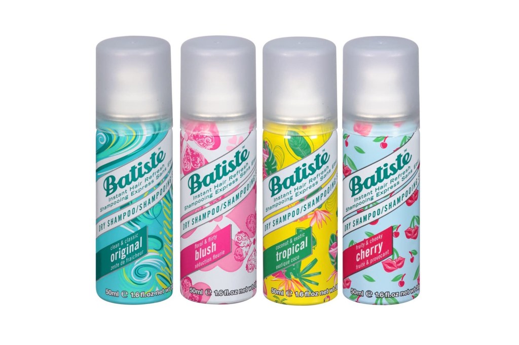 A group of bottles of dry shampoo.