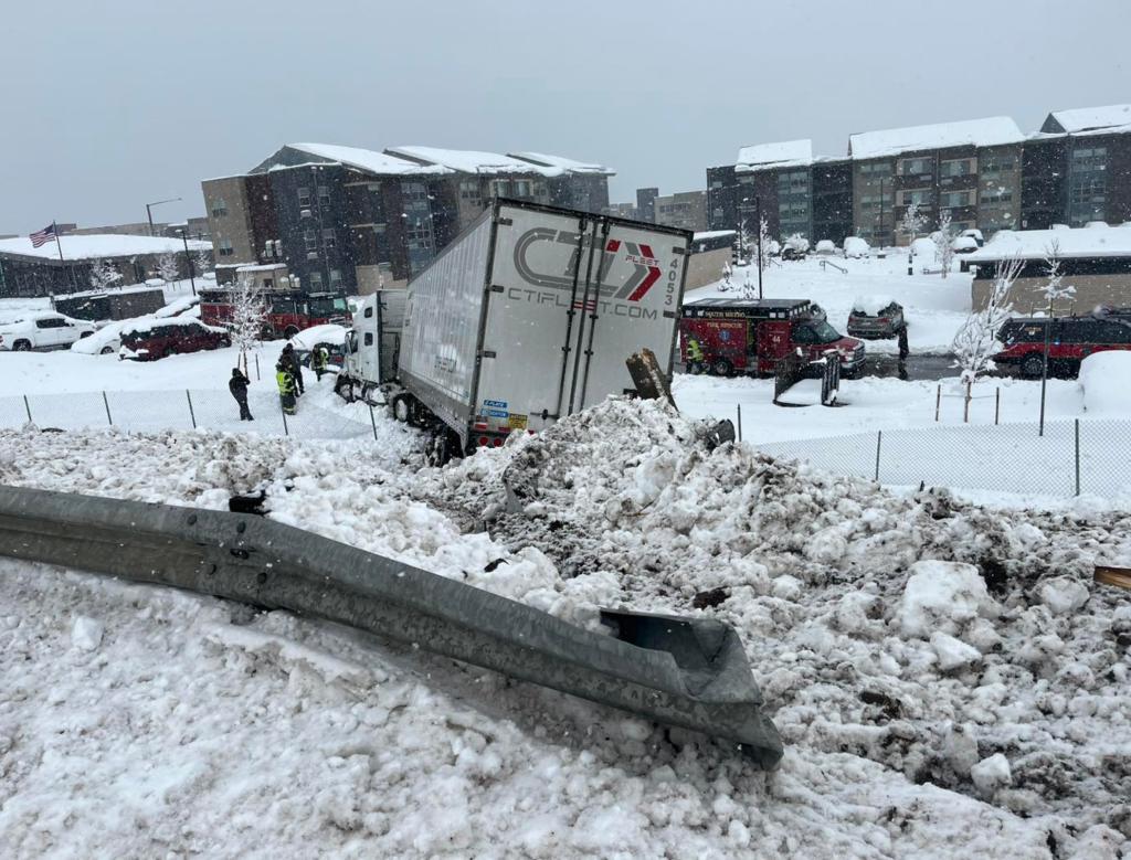 A truck in Englewood, Colorado lost control on the slick highway and ran off the road on March 14, 2024. 