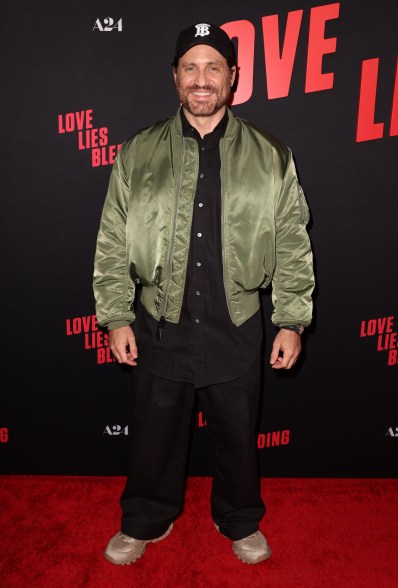 Édgar Ramírez standing in front of a black wall at 'Love Lies Bleeding' Premiere Screening in Los Angeles, California on March 5, 2024.