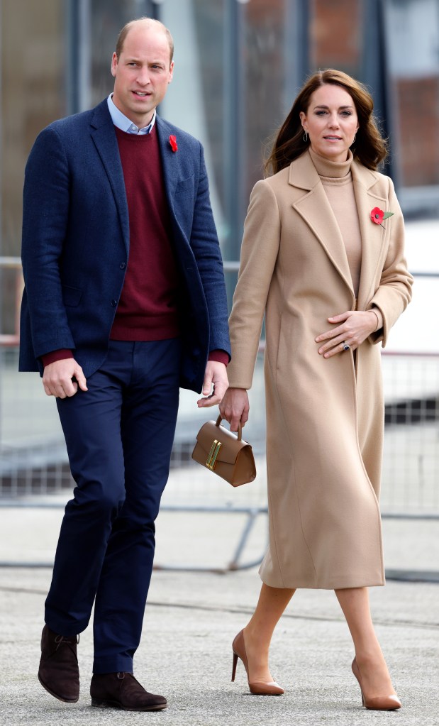 Prince William and Kate Middleton walking. 