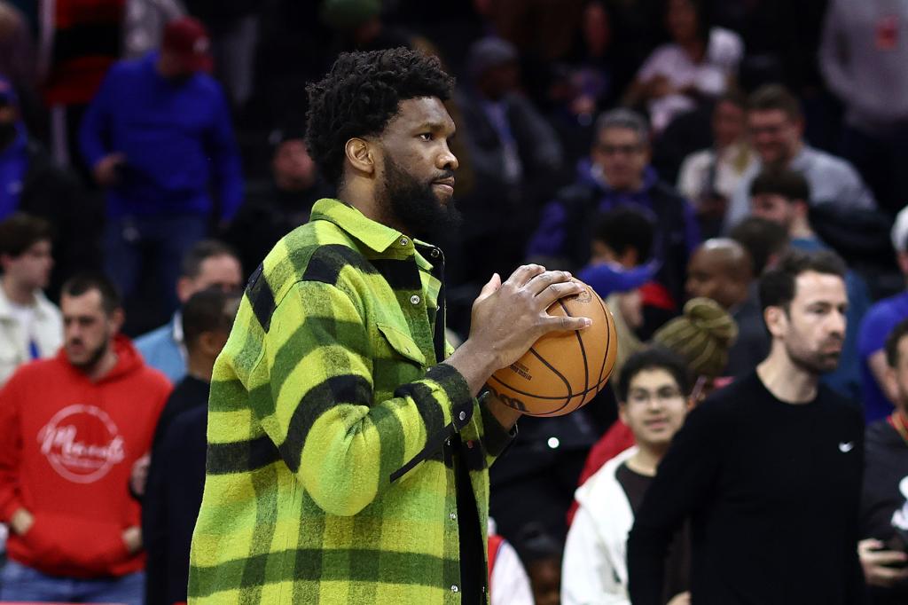 Joel Embiid #21 of the Philadelphia 76ers looks on after a game against the Dallas Mavericks at the Wells Fargo Center on February 05, 2024 in Philadelphia, Pennsylvania. 