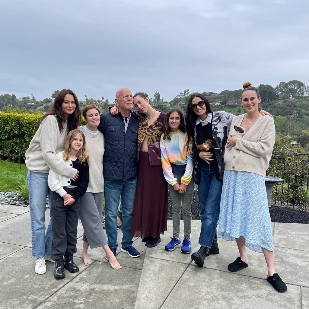 Bruce Willis with his family: daughters Mabel, Evelyn, Rumer, Scout, and Tallulah, wife Emma Heming Willis, and ex wife Demi Moore. 