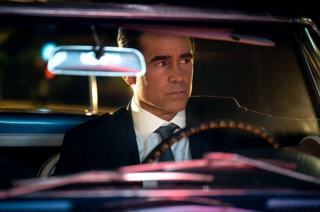 Colin Farrell sitting in a car. 