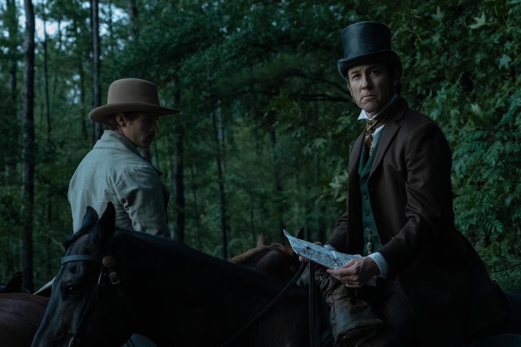 Secretary of War Edwin Stanton (Tobias Menzies, right) on the hunt for John Wilkes Booth in a scene from "Manhunt."