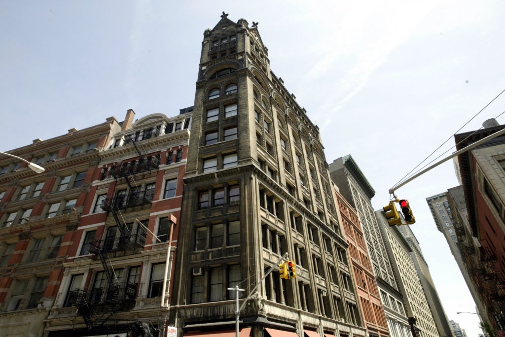 The 1892 Flatiron building stands at the corner of Broadway and 18th St. 