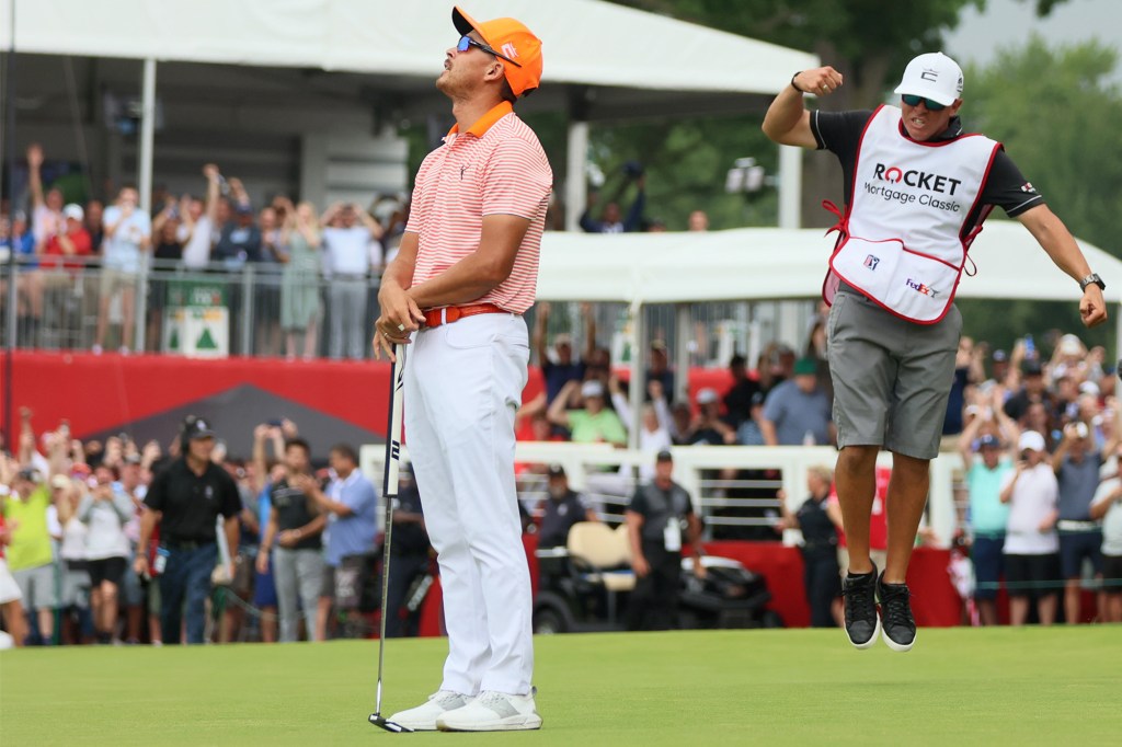 Rickie Fowler reacts to winning a playoff at the Rocket Mortgage Classic in July 2023.