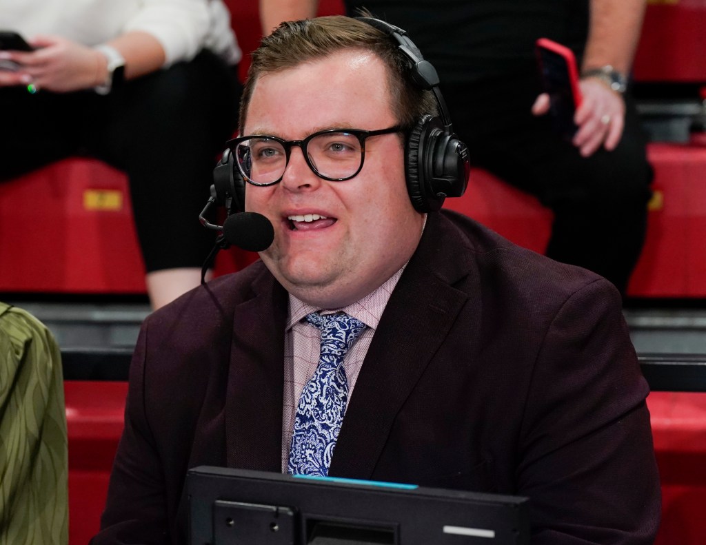 Fox sports announcer John Fanta in a suit and headphones before the game between the St. John's Red Storm and the Stony Brook Seawolves at Carnesecca Arena