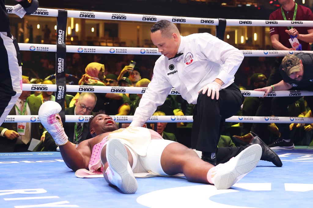 Anthony Joshua knocks down Francis Ngannou.