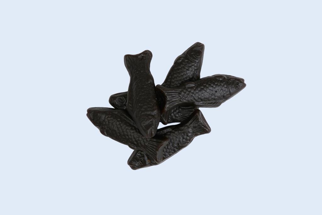 Image of a small brown bag of smoked licorice fish from the brand Kolsvart