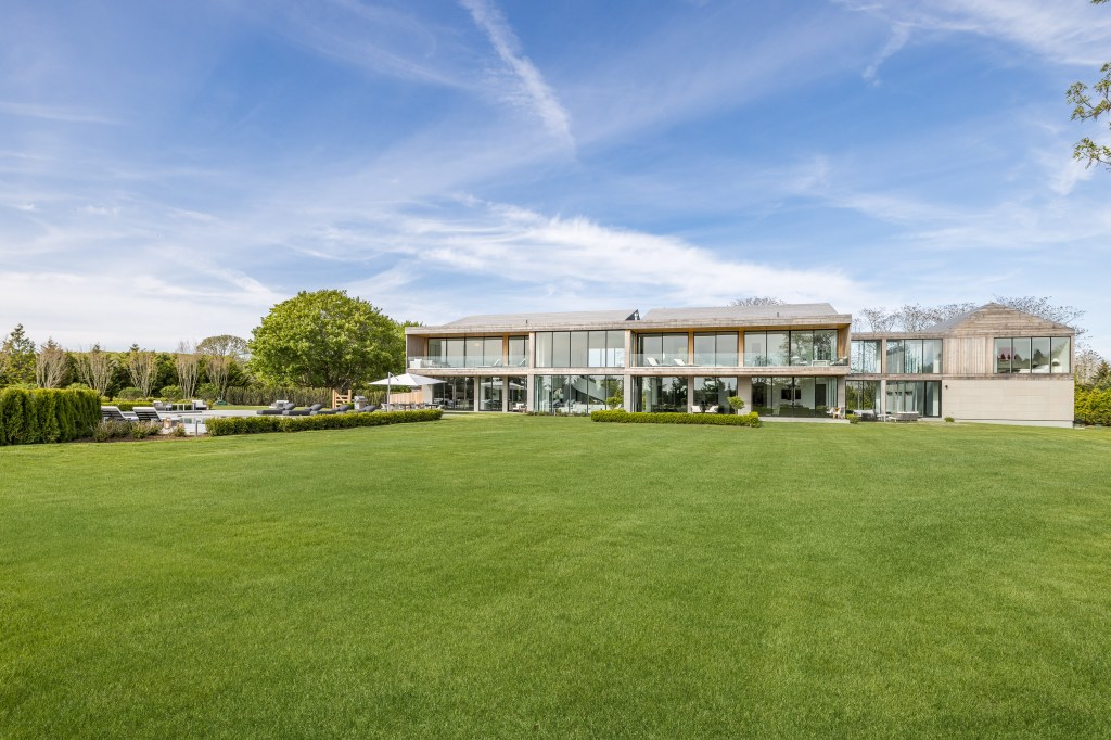 The modern beach house with farm views was completed. 