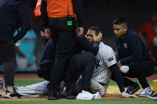 Oscar Gonzalez fouled a pitch off his face during the Yankees' game Monday.