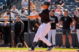 New York Yankees center fielder Trent Grisham #12, at bat hitting live batting practice at Steinbrenner Field, the Yankees Spring training complex in Tampa Florida.