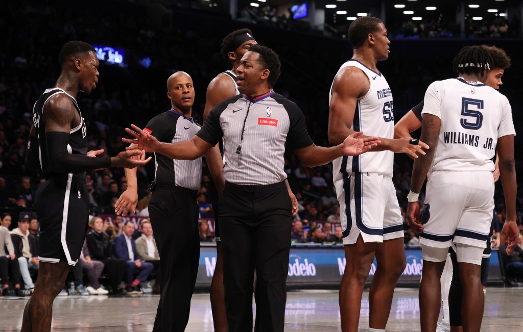 Lonnie Walker IV (8) was hit with a flagrant foul on Memphis Grizzlies forward Jake LaRavia (3) during the first half when the Brooklyn Nets played the Memphis Grizzlies.