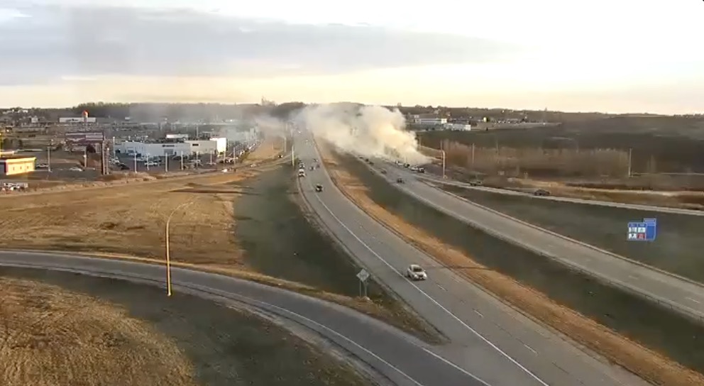 Smoke seen over the highway after the balloon collided with the power line.