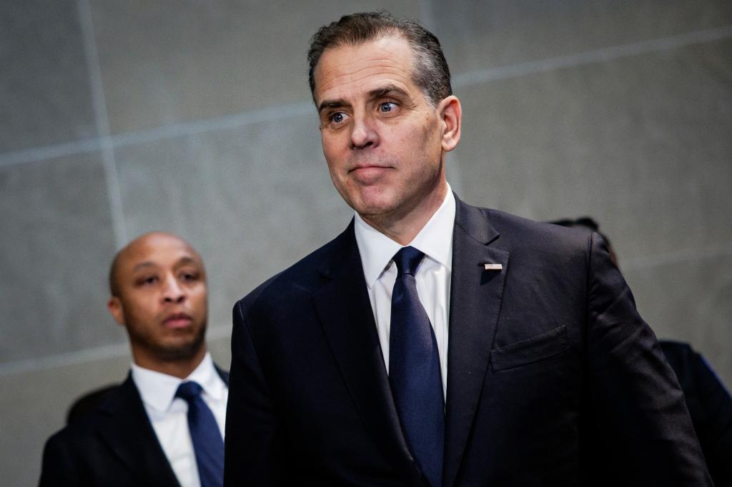 WASHINGTON, DC - FEBRUARY 28: Hunter Biden, son of U.S. President Joe Biden, listens as his attorney Abbe Lowell makes a statement to the press following a closed-door deposition before the House Committee on Oversight and Accountability, and House Judiciary Committee in the O'Neill House Office Building on February 28, 2024 in Washington, DC.