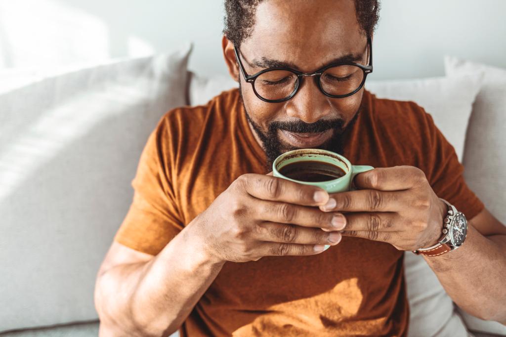 Man sipping coffee