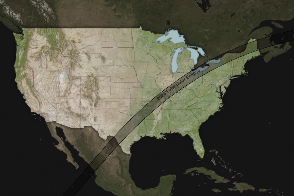 A map showing the continental US with a gray band across part of its midsection, showing the path of the 2024 total eclipse.