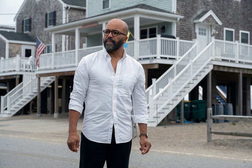 Jeffrey Wright in a scene from American Fiction - a man standing in front of a house.