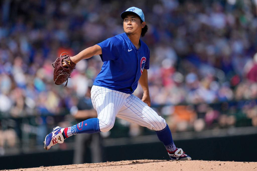 Chicago Cubs starting pitcher Shota Imanaga, of Japan, throws against the Oakland Athletics during the second inning of a spring training baseball game Thursday, March 14, 2024, in Mesa, Ariz.