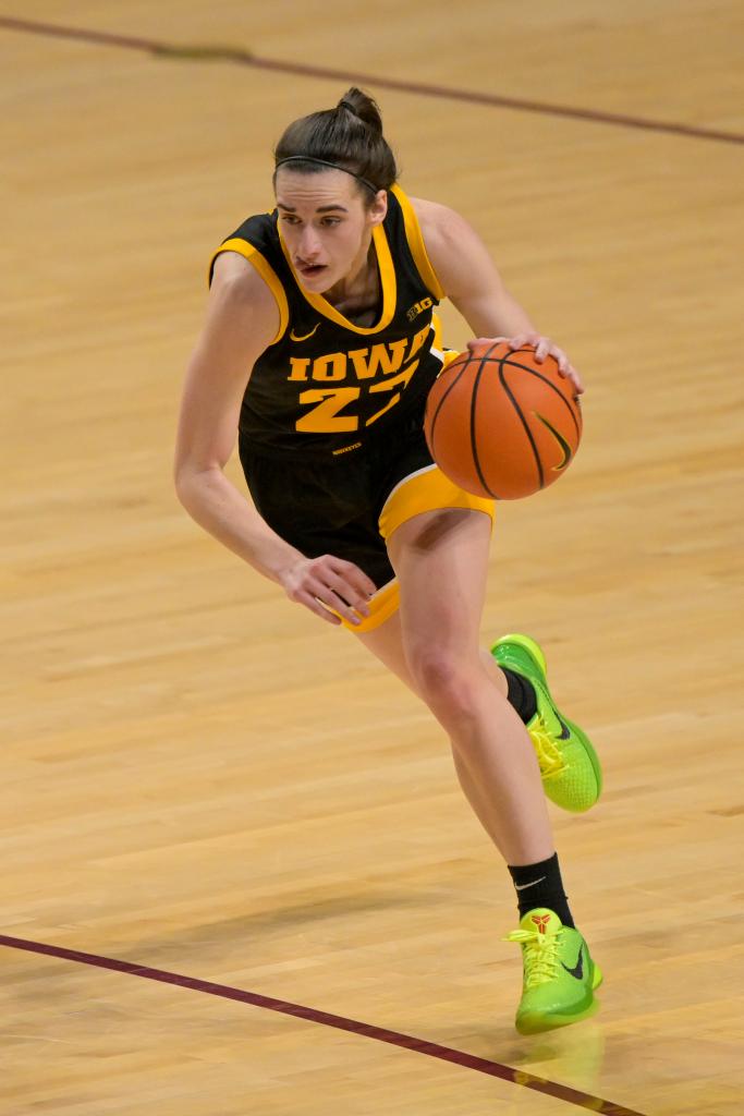 Iowa Hawkeyes guard Caitlin Clark (22) drives to the basket against the Minnesota Golden Gophers during the second quarter at Williams Arena on Feb 28, 2024. 