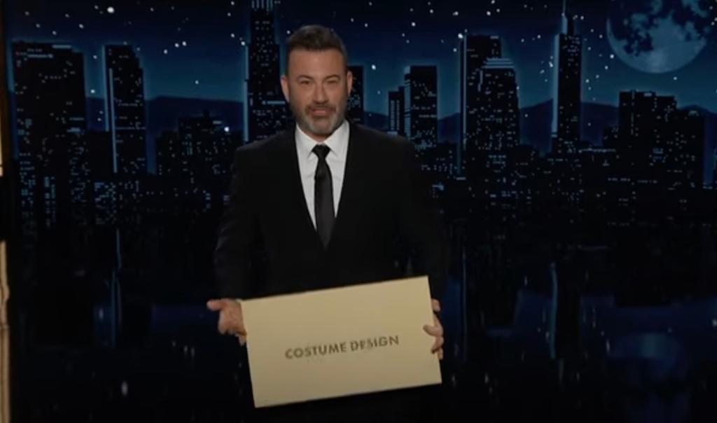 Jimmy Kimmel, delivering his "Jimmy Kimme Live" monologue, showing the larger envelope that ABC officials wanted to use for John Cena's "naked" skit.