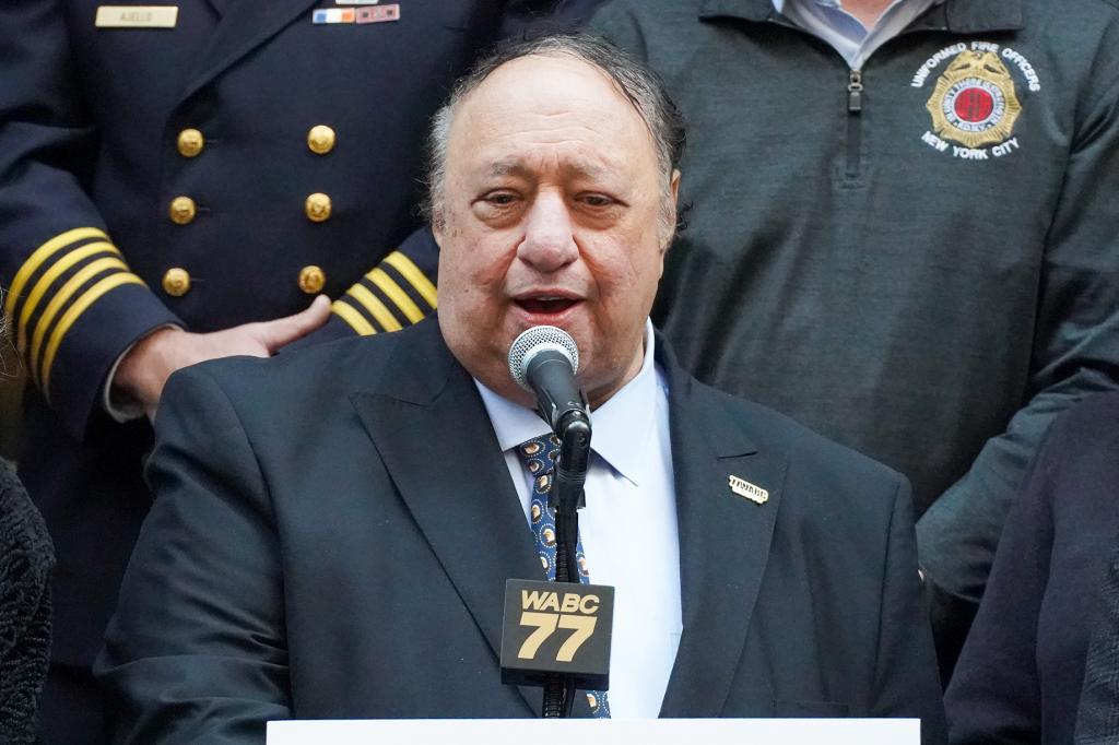 John Catsimatidis speaking at a microphone