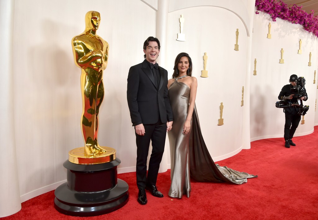 Olivia Munn and John Mulaney at  the 2024 Oscars. 