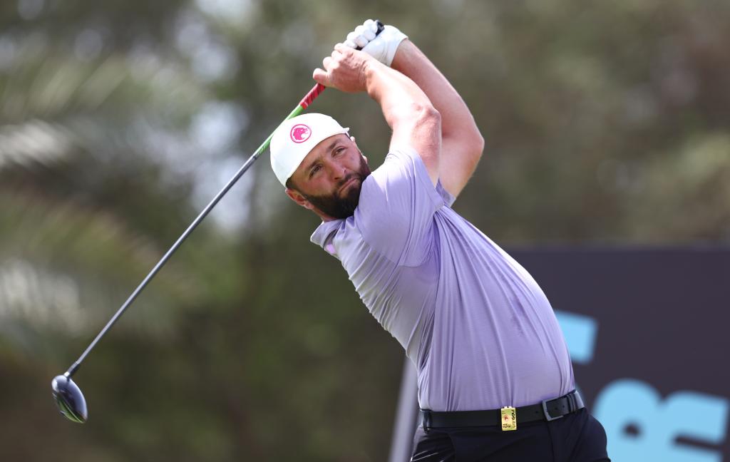 Jon Rahm swinging a golf club during the LIV Golf Invitational in Jeddah, Saudi Arabia on March 1, 2024