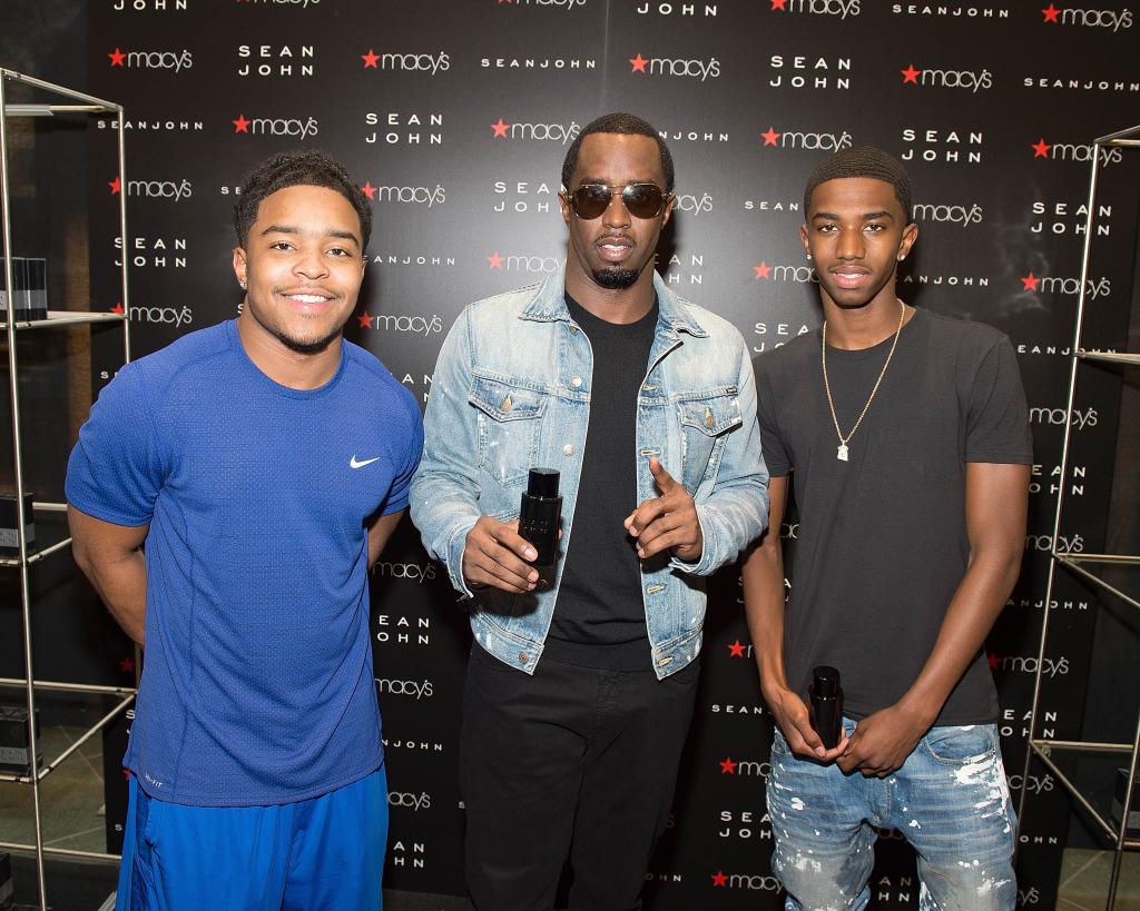 Sean 'Diddy' Combs with his sons, Justin and Christian 'King' Combs, at the launch of Sean John fragrance at Macy's Lenox Square, Atlanta