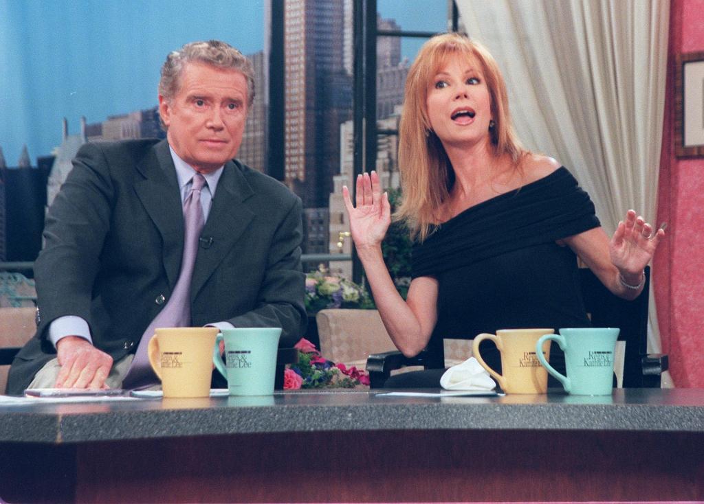  Kathie Lee Gifford with co-host Regis Philbin on an episode of "Live with Regis and Kathie Lee" in 2000.