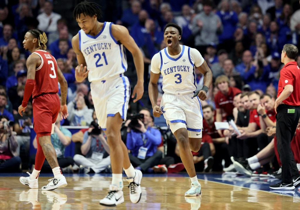 Kentucky's Adou Thiero celebrates a 3-pointer by star D.J. Wagner. 