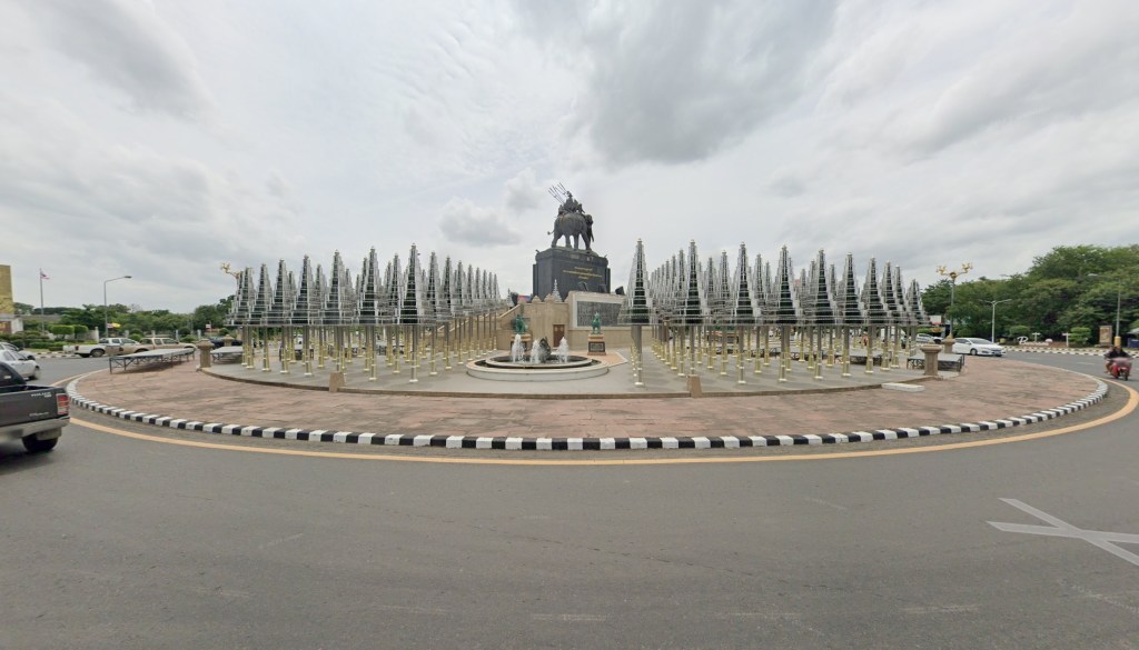 Apatsara posed in revealing clothing in front of the King Rama I statue in Buriram province on March 24.