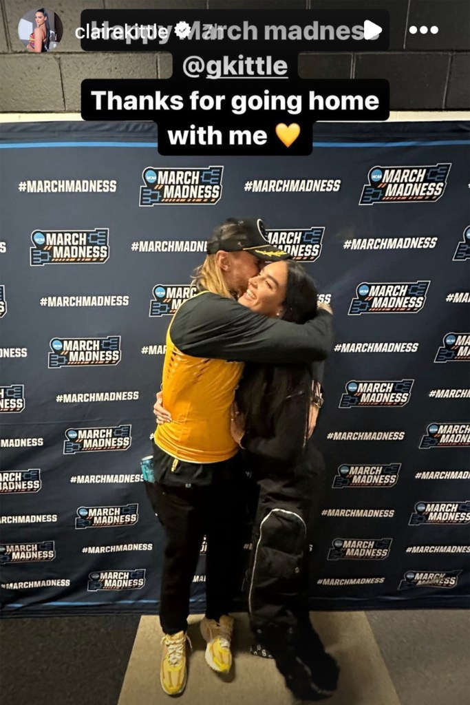 George Kittle and wife Claire embrace during their March Madness date.